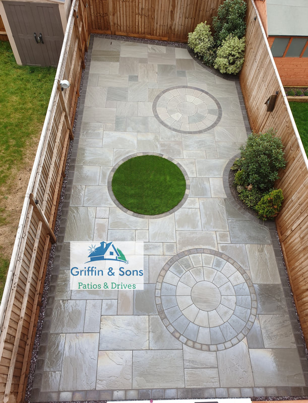 Kandla Grey/Mountain Mist Indian Sandstone Patio with Circle Packs and Charcoal Brick Edging 
